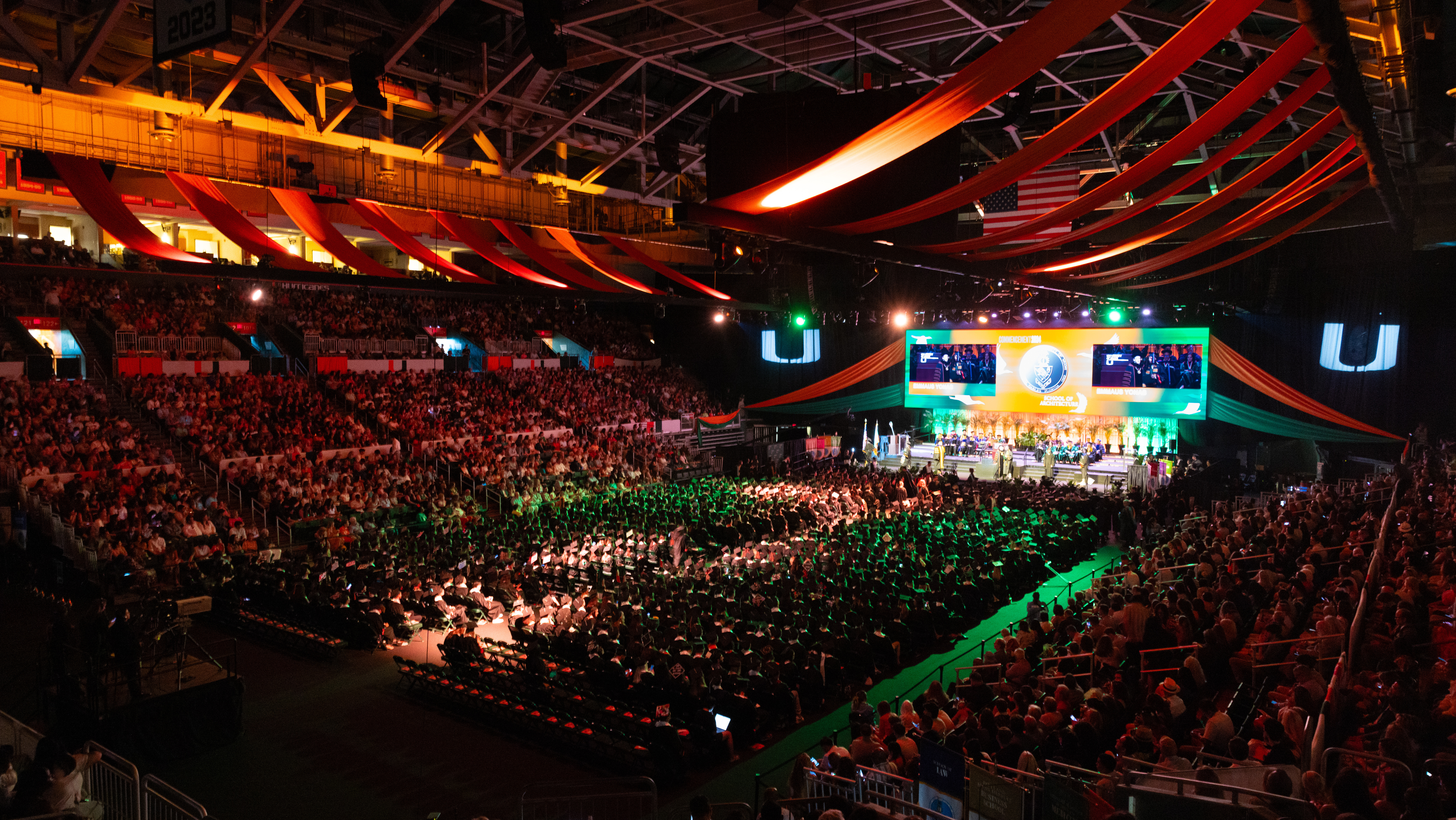 graduating students sitting at commencement